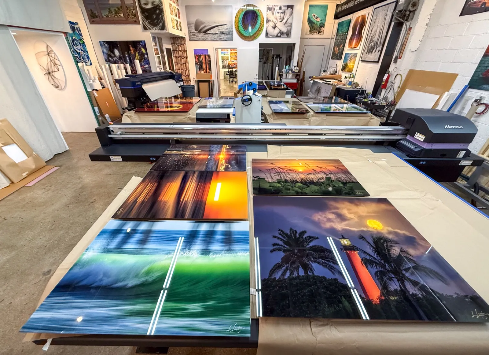 Finished prints laid out on the print floor at the aiPRINT studio in Florida